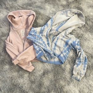 Two gap teen sweatshirts, one pink and one blue and white.